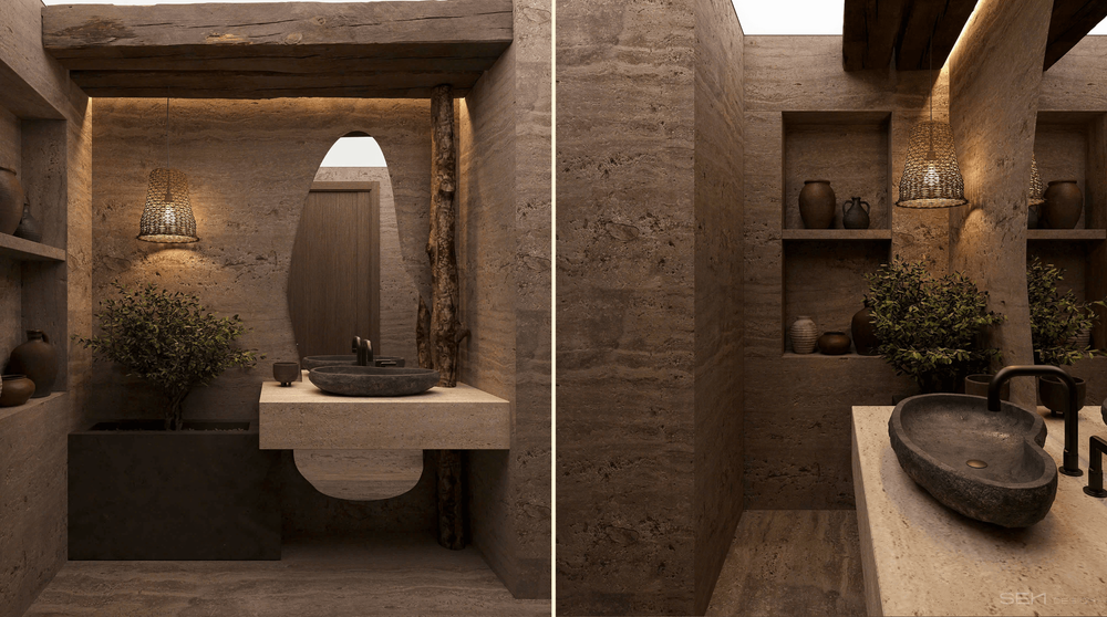 Raw stone surfaces and warm ambient lighting come together to create a rich sense of depth, enveloping the bathroom in an atmosphere of understated warmth and tranquility.