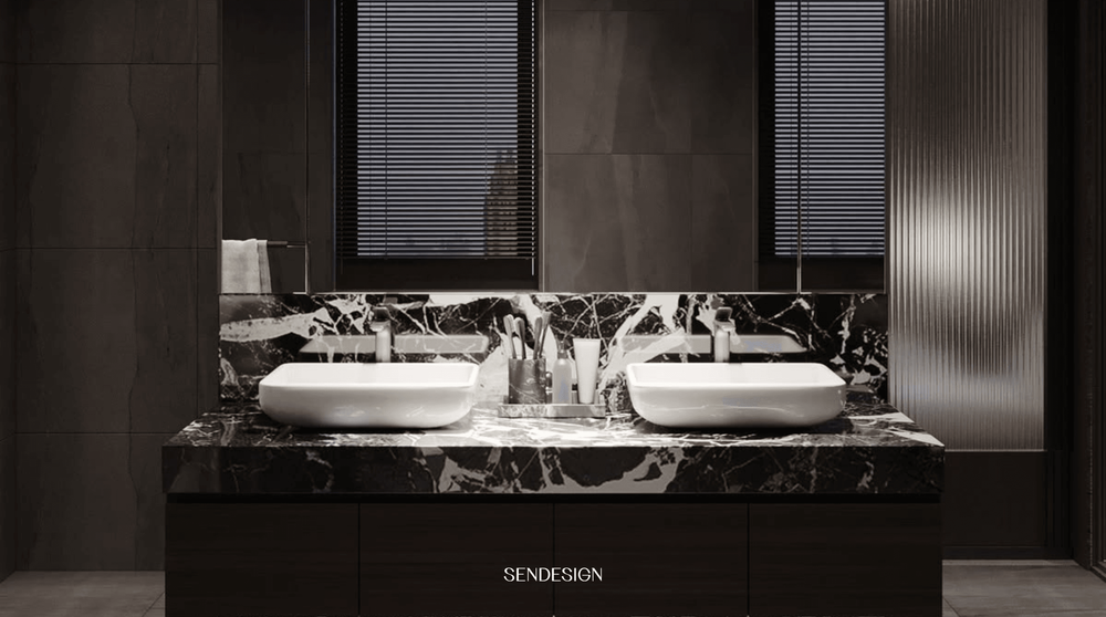 The marble surface, defined by its striking white veining, serves as a visual focal point while bringing a sense of calm and quiet sophistication to the bathroom.