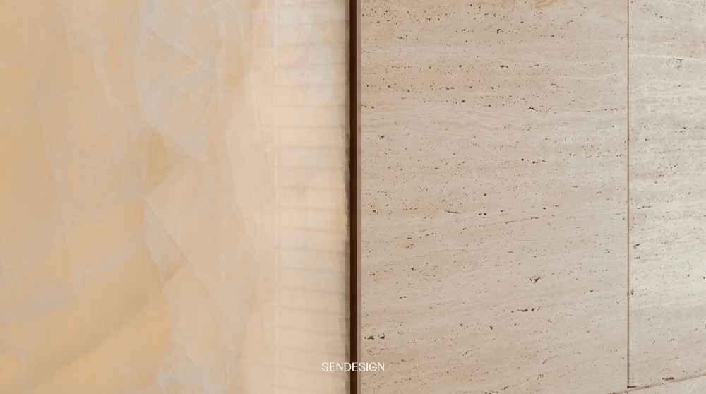 As light moves across the surface, it reveals the intricate layers and natural veining of the stone, bringing a quiet sense of depth and character to the Heritage Duplex apartment.